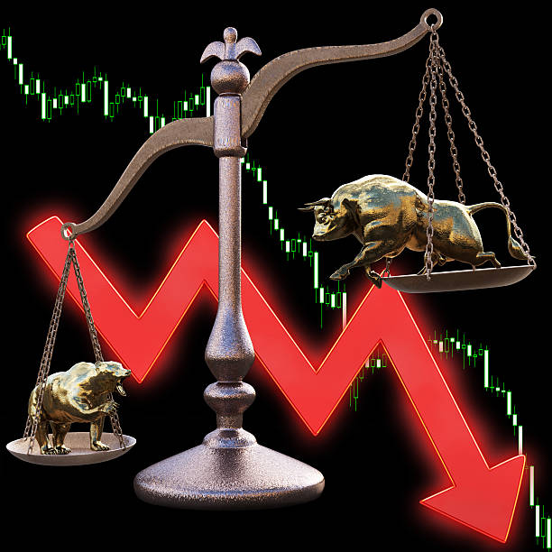 istock bear and bull on the scales 520648922