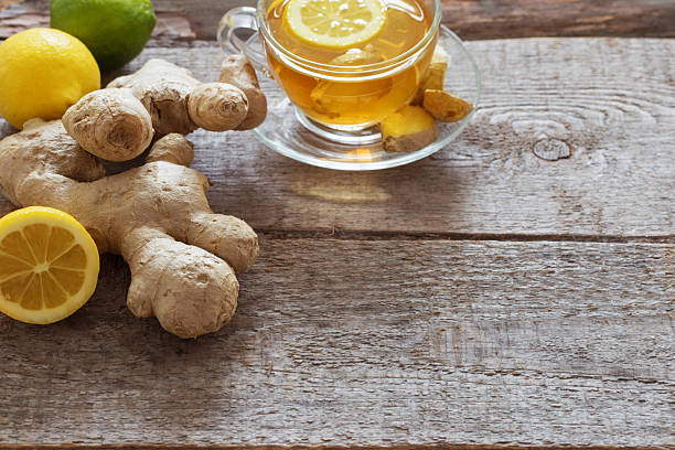 istock cup of ginger tea on a wooden table 520649152