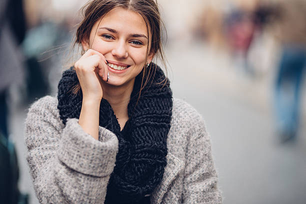 istock Pretty woman sitting on the bench and smile 520649502