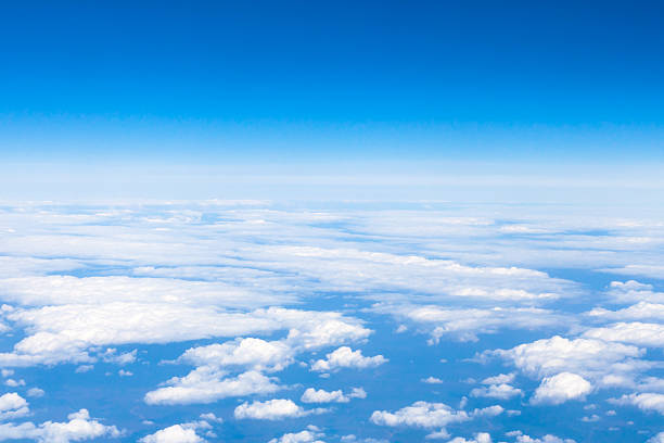 istock above view clouds and earth horizon from aircraft 520650742