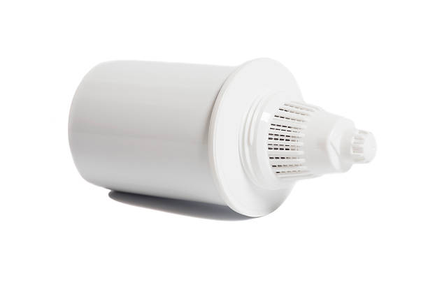 istock Water Filter cartridge isolated on white background 520653486