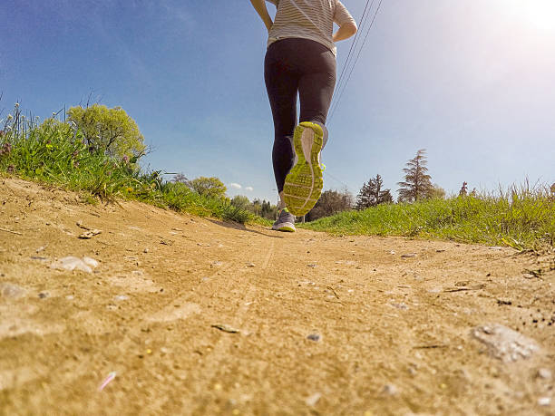istock Runner Feet Running , Closeup - outdoor shot 520658336
