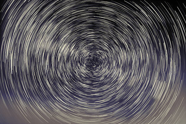 istock abstract long exposure of star trails background 520658453