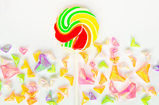 One piece colorful candy on white background.