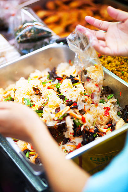 istock Filling plastic bag with food 520660527