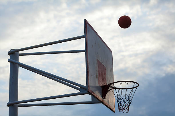 istock basketball court ring board against the sky 520660888