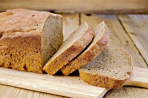 istock Rye homemade bread sliced on the board 520660979