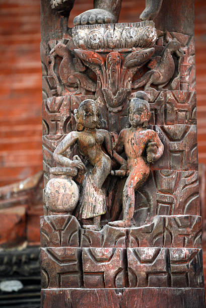 Erotic wooden carving on a Hindu temple in Nepal Erotic carving, explicit Kama Sutra position on a Nepalese temple in Patan, Kathmandu, Nepal lingam yoni stock pictures, royalty-free photos & images