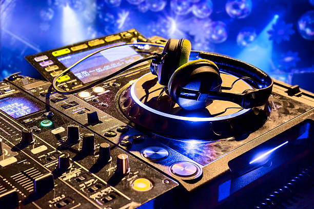 istock Dj mixer with headphones 520661403