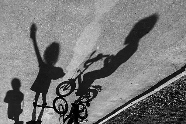 istock Shadows of playing children 520661686