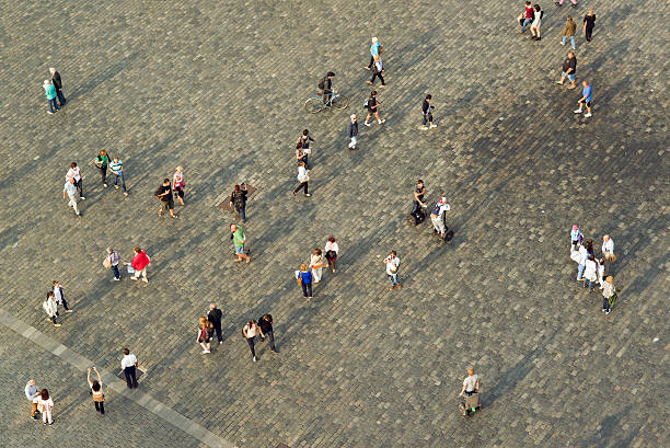 Prague, Czech Republic - September 9, 2014: Tourists at Prague Old Town square walking in different directions