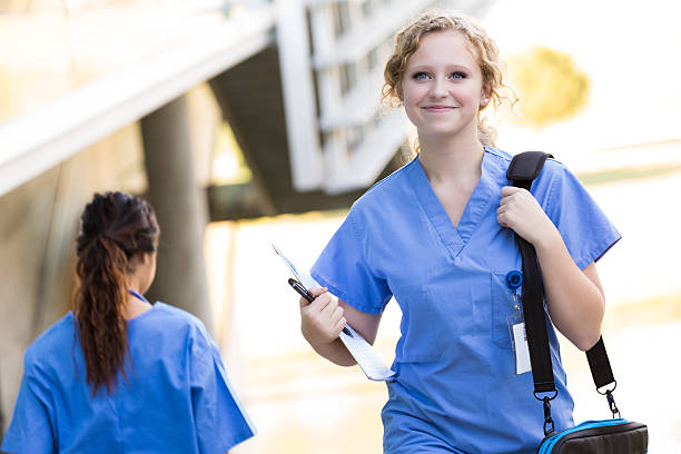 Nursing or medical student walking to class on hospital campus