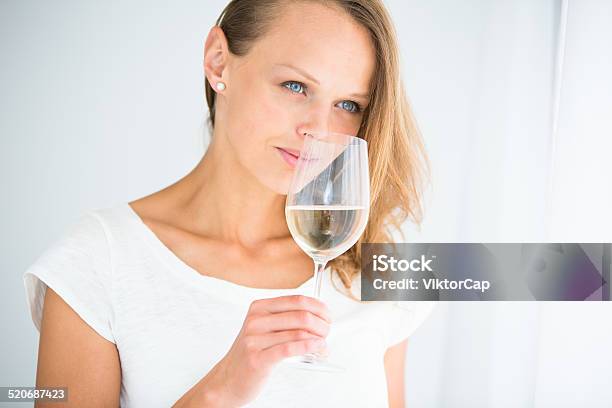 Gorgeous Young Woman With A Glass Of Wine Stock Photo - Download Image Now - Adult, Alcohol - Drink, Bar - Drink Establishment