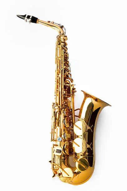 Photo of Alto saxophone, side view on white background