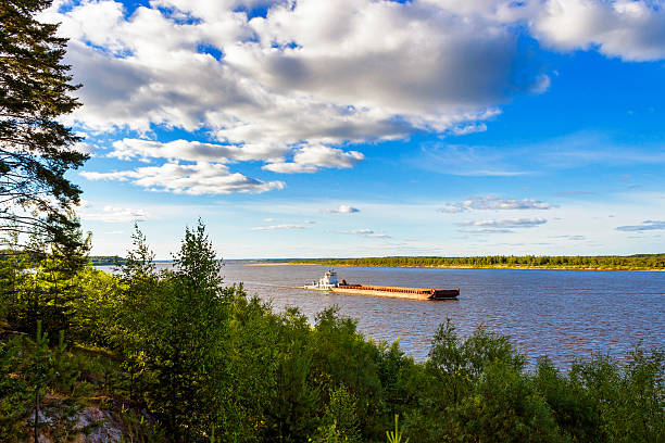 barge on river stock photo