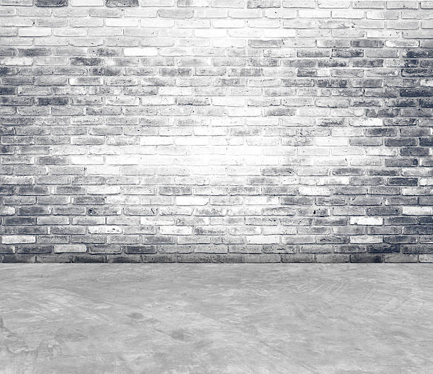 istock Brick wall and cement floor room in perspective,interior background 520690921