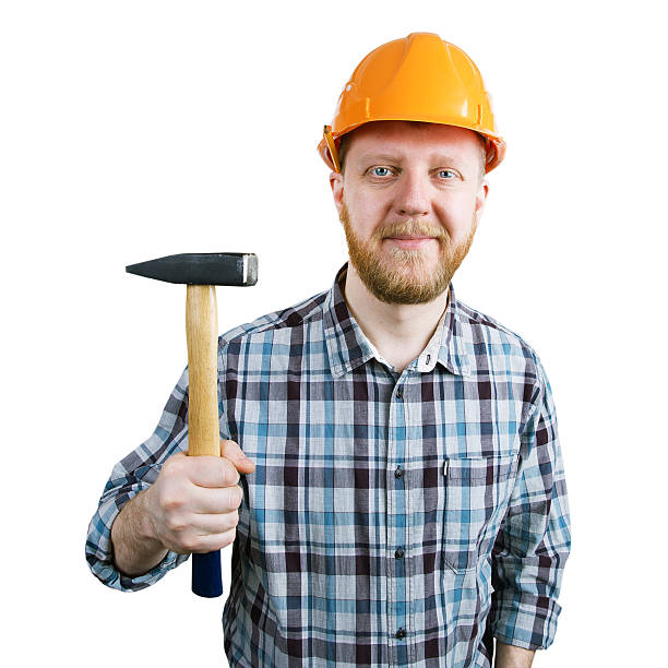 istock Bearded man in a helmet with hammer 520700552
