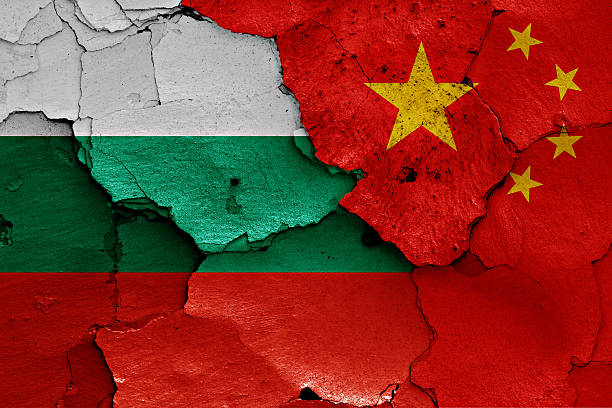 istock flags of Bulgaria and China painted on cracked wall 520700904