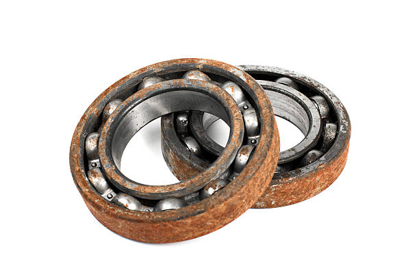 istock Old and rusty ball bearing, isolated on white background 520701424