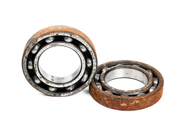 istock Old and rusty ball bearing, isolated on white background 520701506