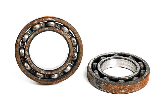 istock Old and rusty ball bearing, isolated on white background 520701548