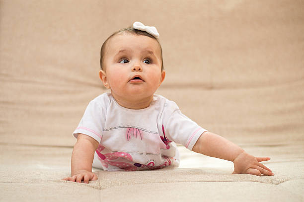istock Cute baby girl 520702374