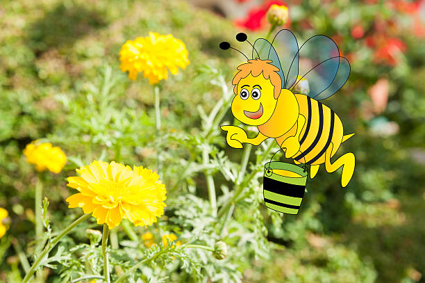 istock Bee holding a honey bucket and flower 520704043