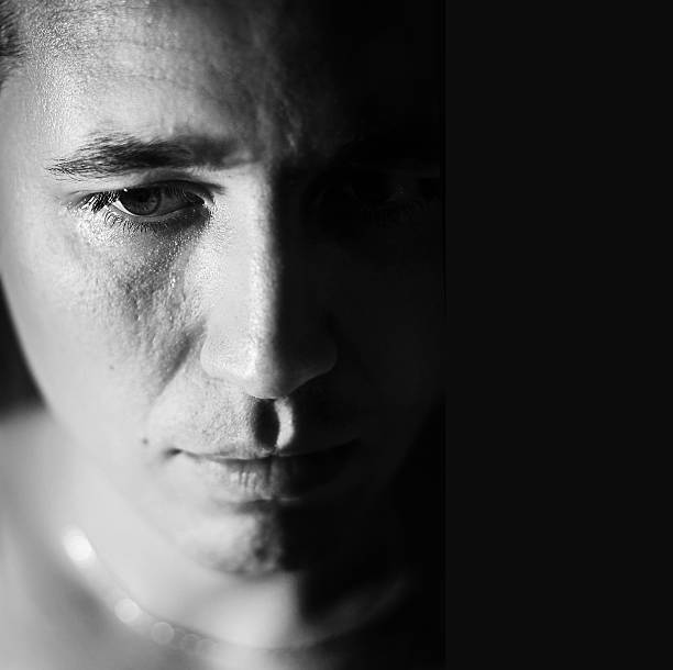 istock Men tear. The man was crying. Depression. 520704214