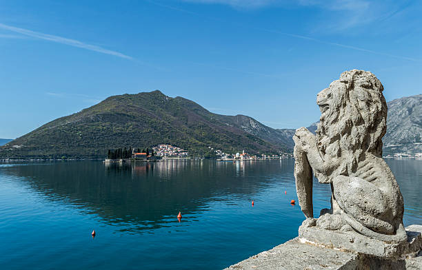 istock Lion statue in Perast and two islands 520704922