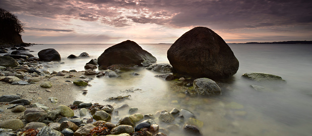 Rugen Island Seascape with Huge Boulders under Dramatic Cloudy Sky