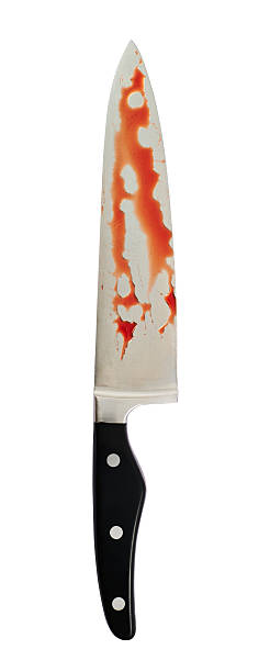 istock Chef's steel knife covered with blood 520705236