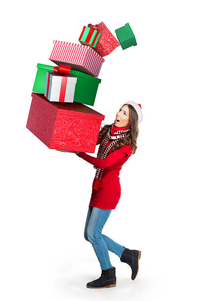 折りたたみプレゼントの山を運ぶ若い女性 - vertical single flower women teenager ストックフォトと画像