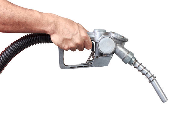 istock worker holding a gasoline classic fuel nozzle isolated on white 520706269