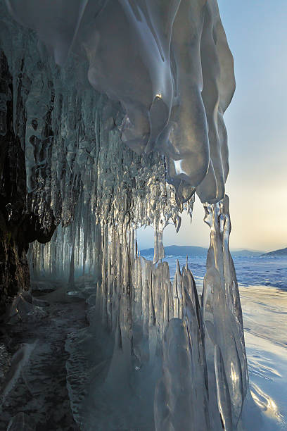 istock Ice stalactites and stalagmites in the rock 520709220