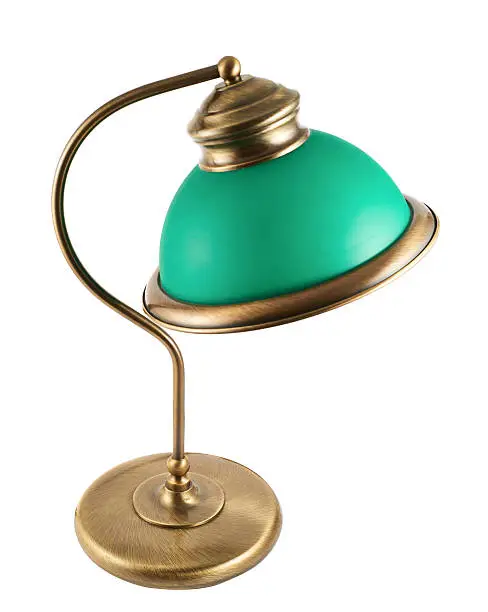 Metal table-lamp with a green lampshade isolated over white background