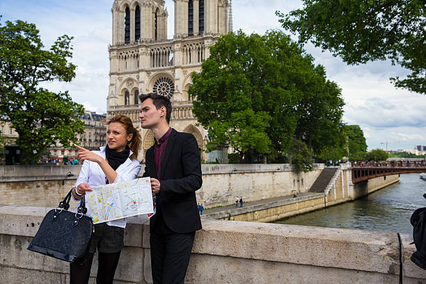 istock Couple looking for directions in Paris 520710129