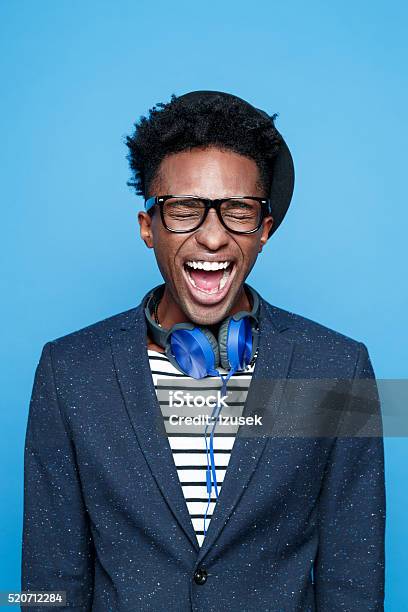 Funky Afro American Guy Screaming Stock Photo - Download Image Now - Colored Background, Fashion Model, Adult