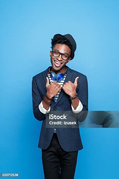 Funky Afro American Guy In Fashionable Outfit Stock Photo - Download Image Now - Men, Thumbs Up, African-American Ethnicity