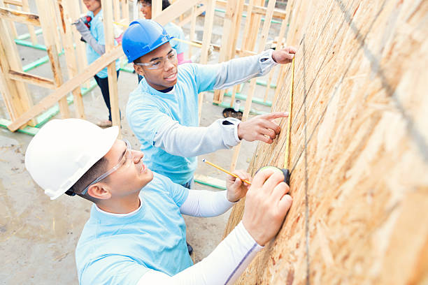 istock Busy volunteers working on charity home 520712690