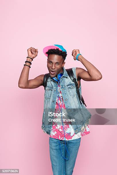 Summer Portrait Of Funky Afro American Guy Stock Photo - Download Image Now - Backpack, Dancing, Adult