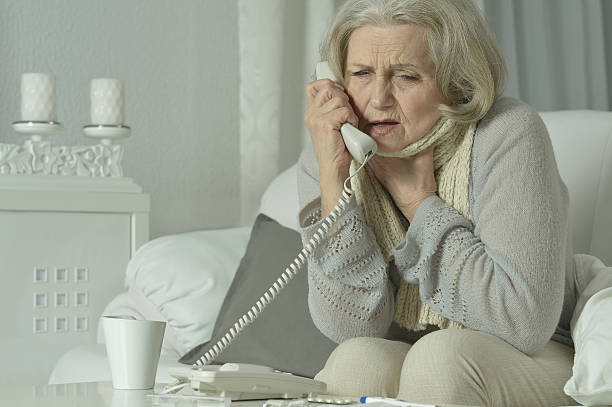 istock Mature woman calling doctor 520715772