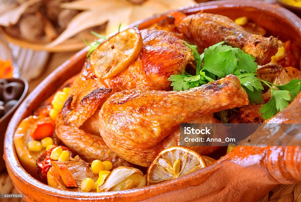 Tasty baked chicken Tasty baked chicken, traditional Thanksgiving day celebration, delicious fried chick, luxury restaraunt menu for autumn holiday Animal Stock Photo