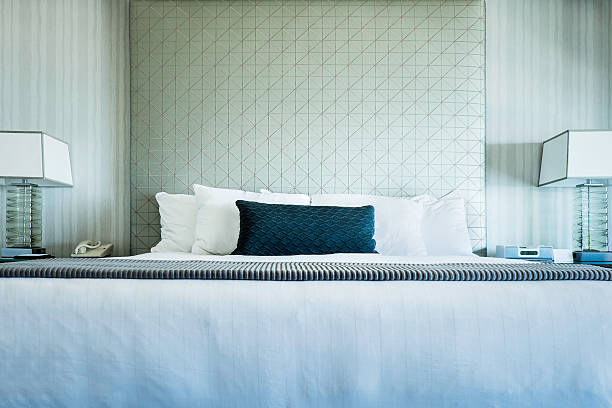 istock King Size Bed in a Luxury Hotel 520733595