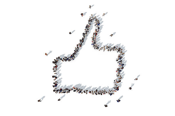 istock Group of people forming a thumbs up symbol 520733808
