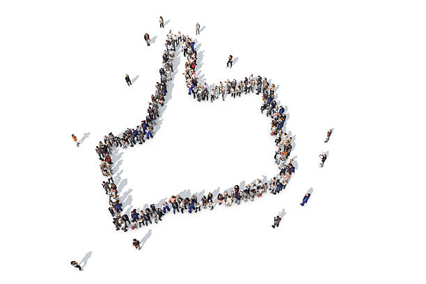 istock Group of people forming a thumbs up symbol 520733834