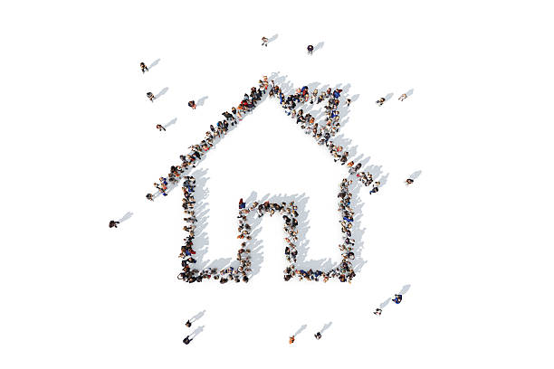 istock Group of people forming a house icon 520733892