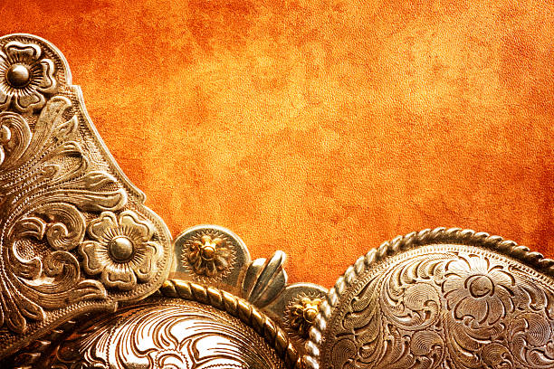 istock Western Belt Buckles On Textured Leahter Surface 520733931