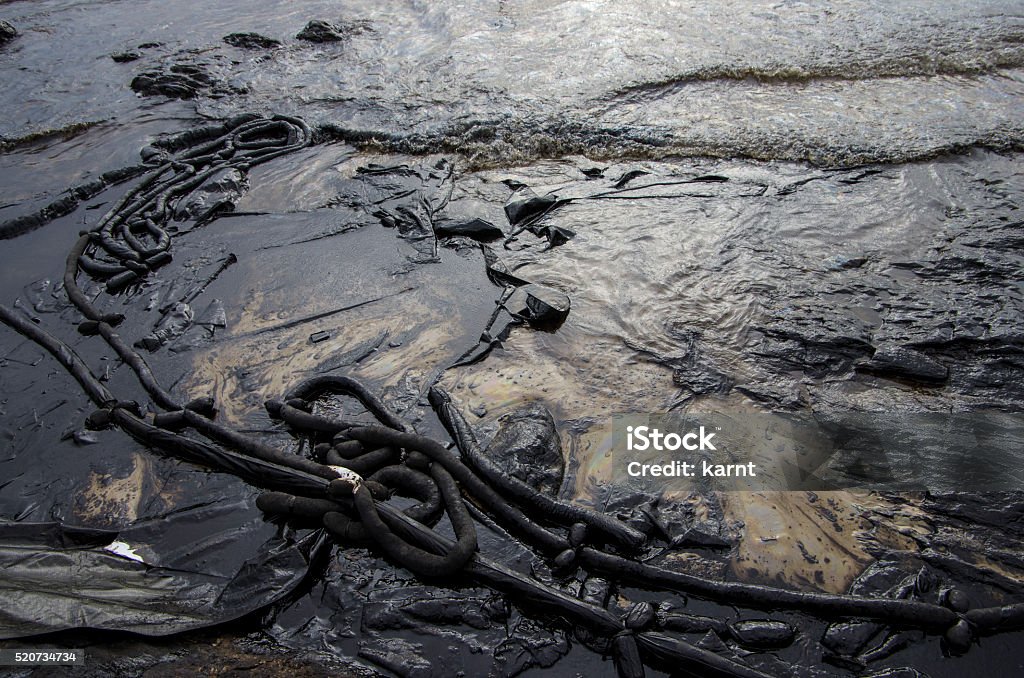 The crude oil on the Ao Proa beach Rayong, Thailand - July 31, 2013: The crude oil on the Ao Proa beach, Koh Samet Island, Rayong province, Thailand during the oil spill. 2013 Stock Photo