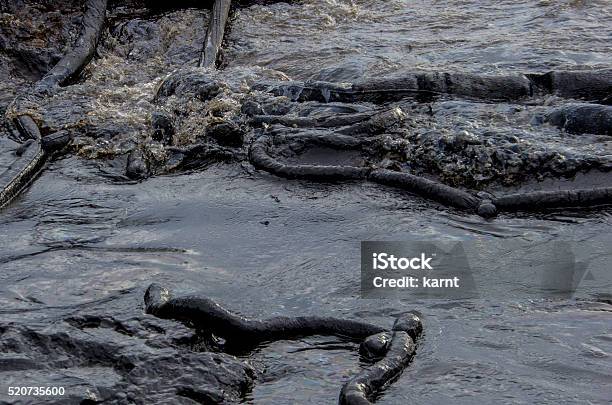 The Crude Oil On The Ao Proa Beach Stock Photo - Download Image Now - 2013, Business Finance and Industry, Containment Boom