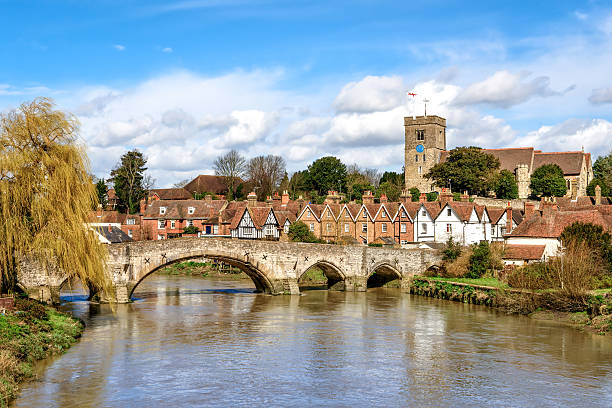 Rural Kent View of Aylesford village in Kent, England with medieval bridge and church. kent england photos stock pictures, royalty-free photos & images